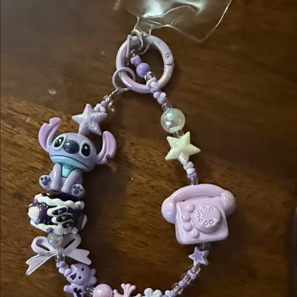 Purple stitch keychain‎